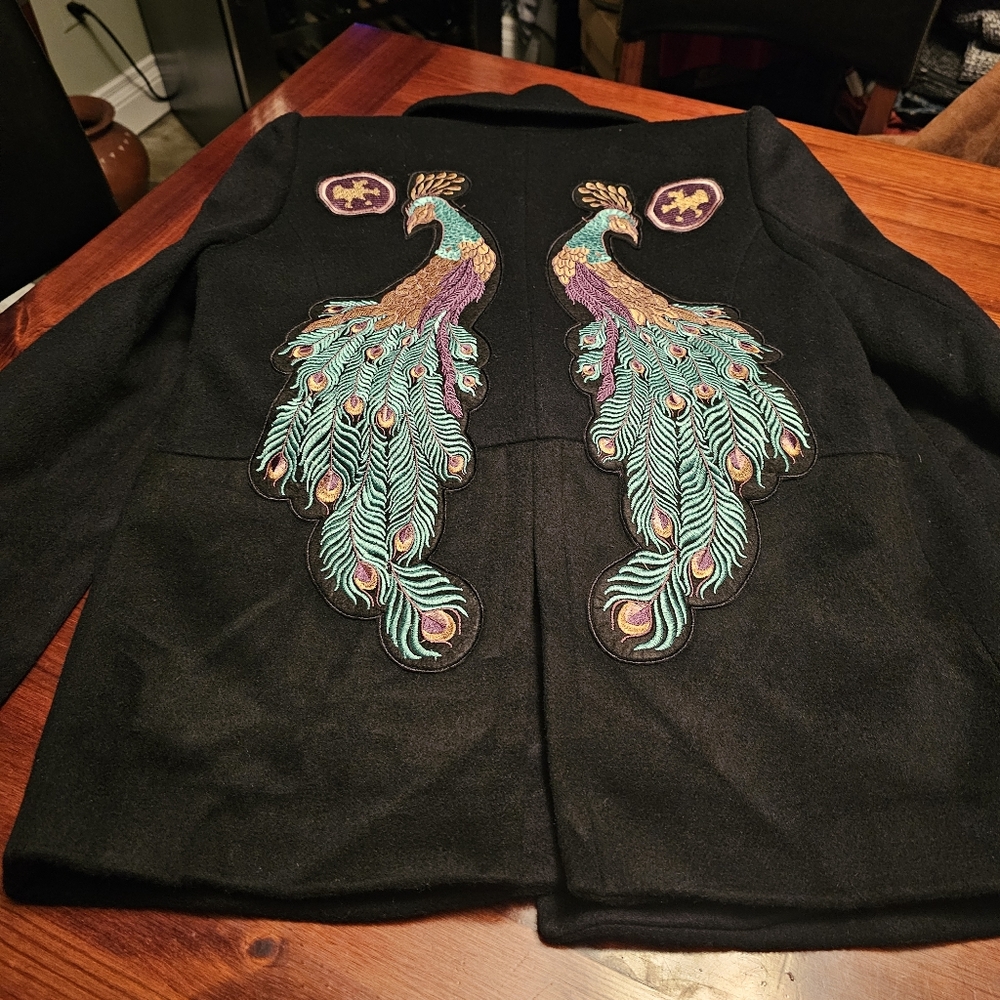 Gorgeous black wool coat with embroidered peacocks.‎
